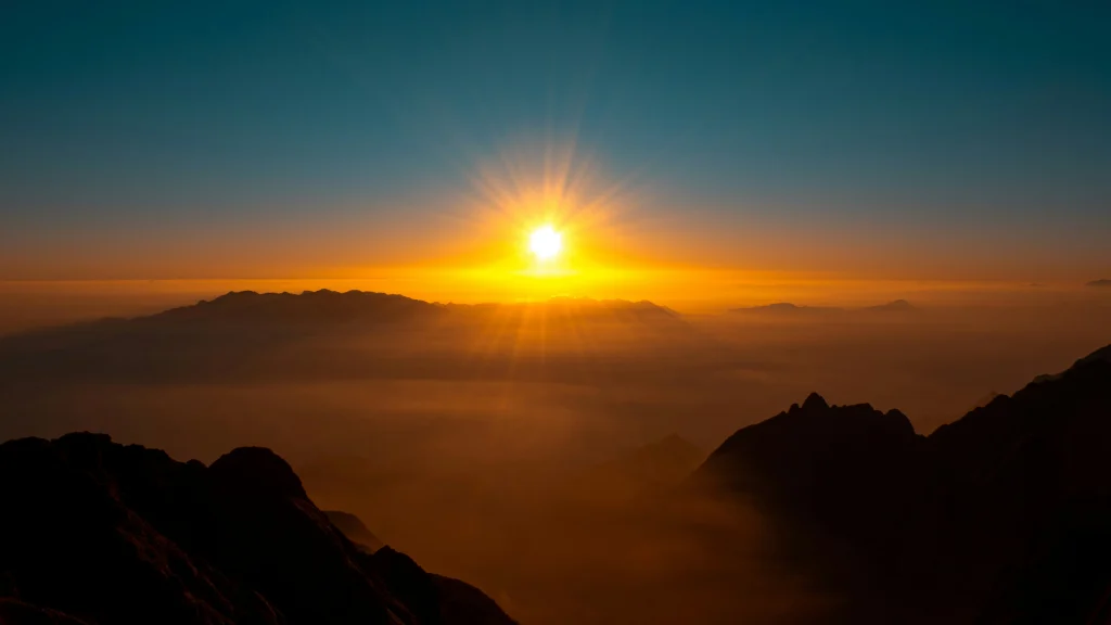 Sunlight filtering through clouds, representing the source of solar energy